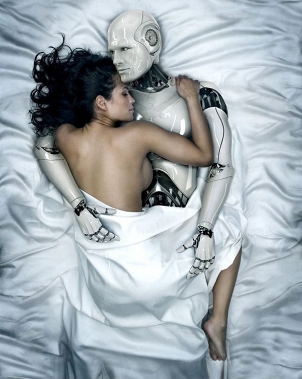 Sexbot in bed with woman.